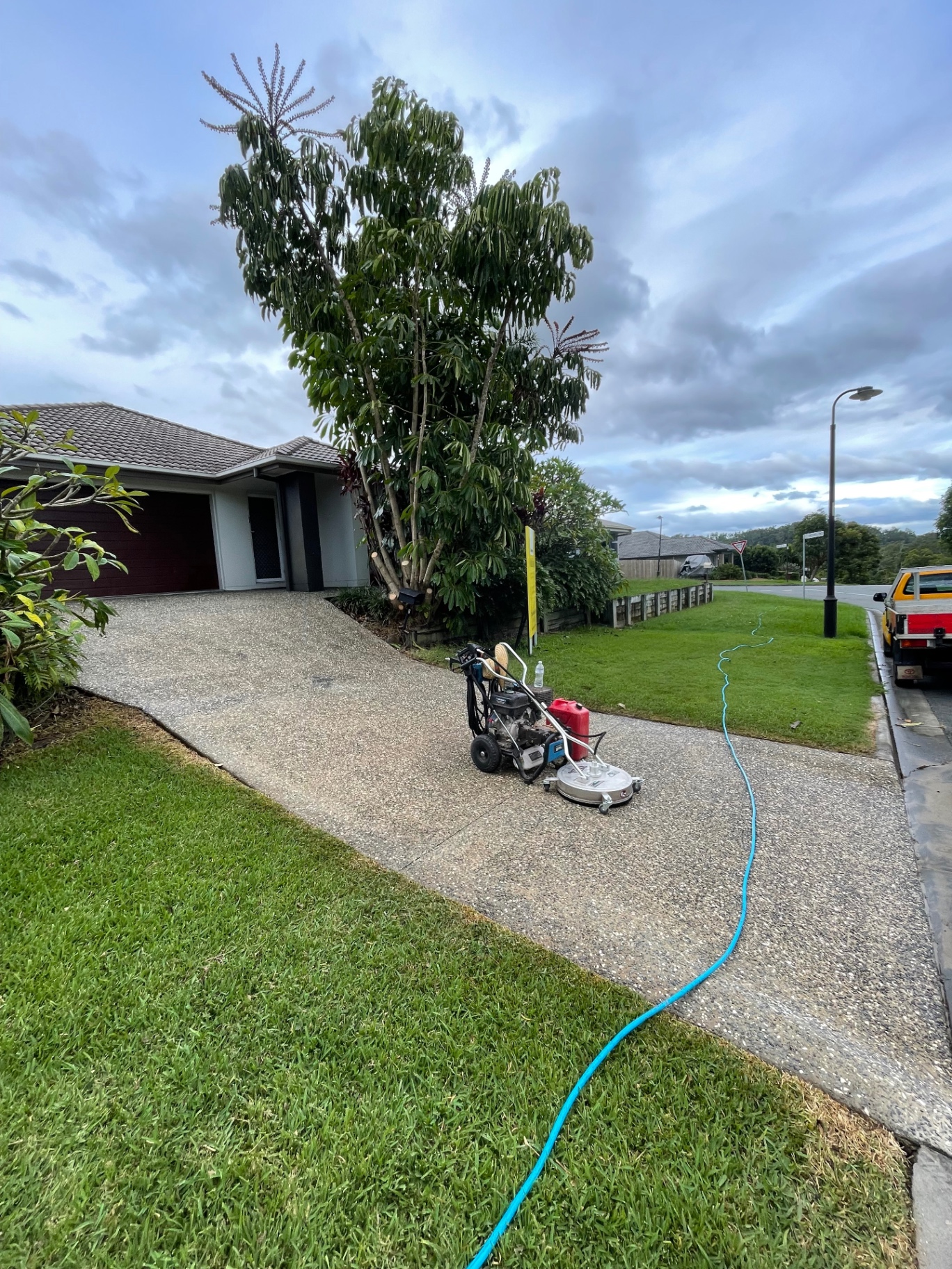 Pressure washing an aggregate driveway